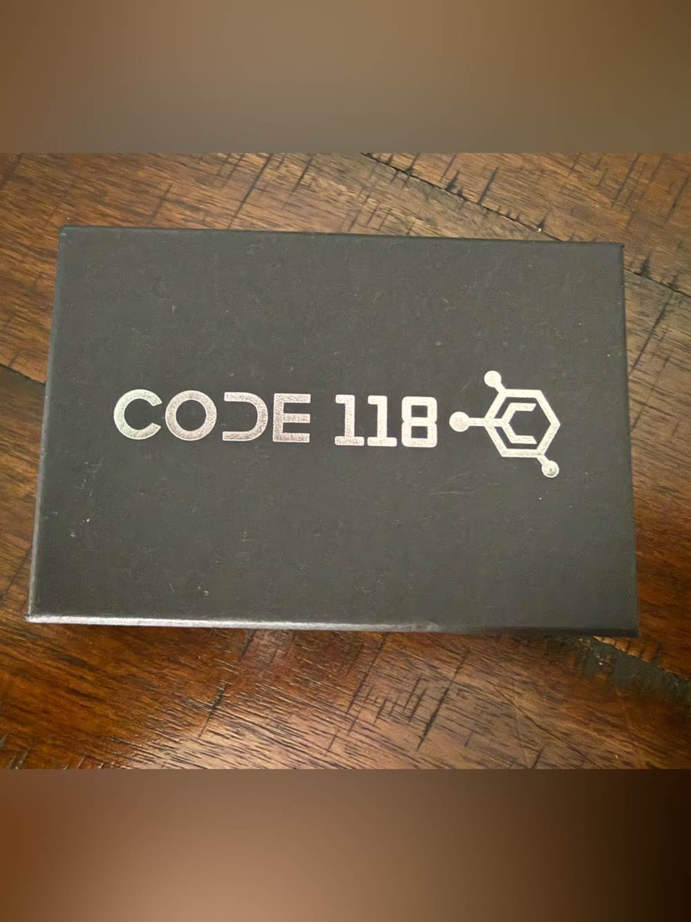 CODE 118 Black Box with Silver Logo